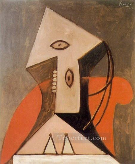 Femme dans un fauteuil rouge 1939 Cubism Oil Paintings